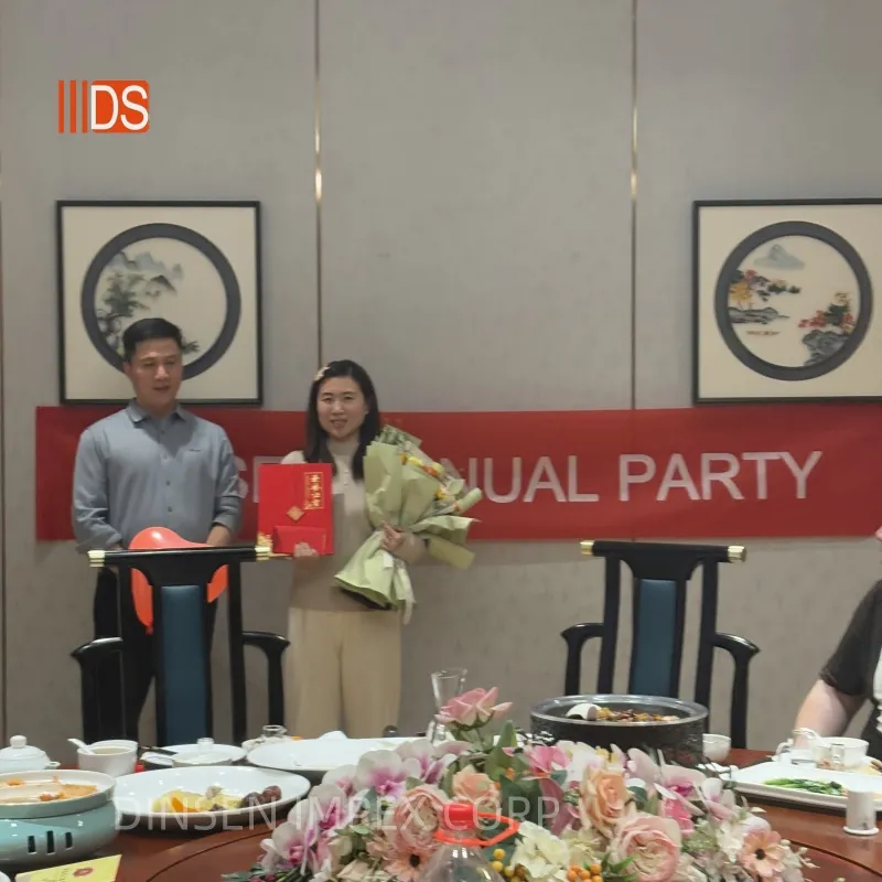 Michele was awarded the title of the most hard-working employee, and Bill presented her with a certificate, bonus and flowers.